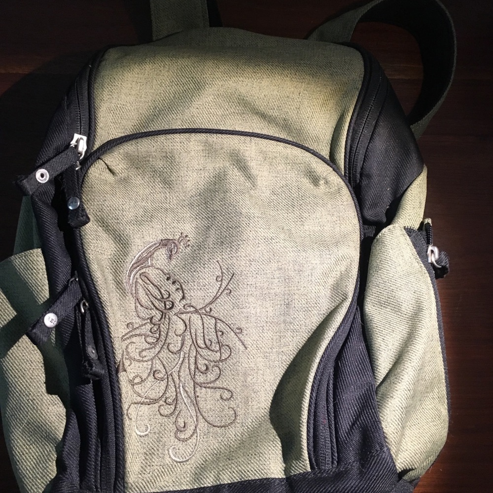 REI backpack with peacock details